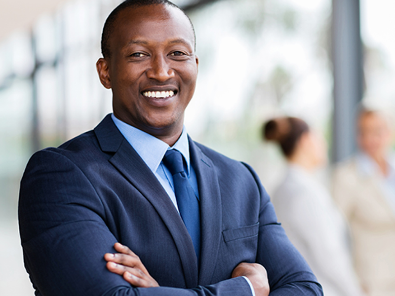 Man smiling in suite